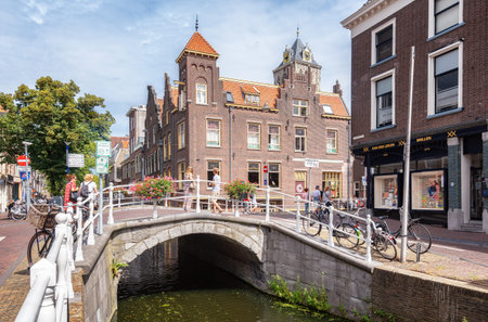 Delft, Netherlands, July 29, 2018:  The corner Ouden Langendijk and Koornmarkt in the Dutch city of Delft in The Netherlandsのeditorial素材