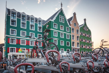 Zaandam, The Netherlands, April 18, 2019: Bicycle parking at Zaandam station with in the background...