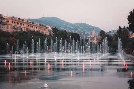 Nice, France, September 20, 2018:  The illuminated Miroir d'eau fountain on the promenade du Paillon in the center of Niceのeditorial素材