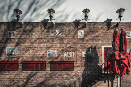 Amsterdam, Netherlands, February 12, 2021: Unique wall of an old house in the center of Amsterdam.のeditorial素材