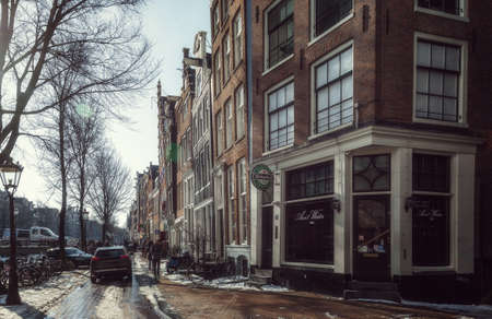 Amsterdam, Netherlands, February 12, 2021: Winter day in the center of Amsterdam.のeditorial素材