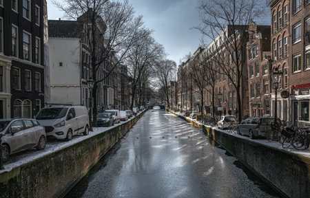 Amsterdam, Netherlands, February 12, 2021: Typical canal houses in the old center of Amsterdamのeditorial素材