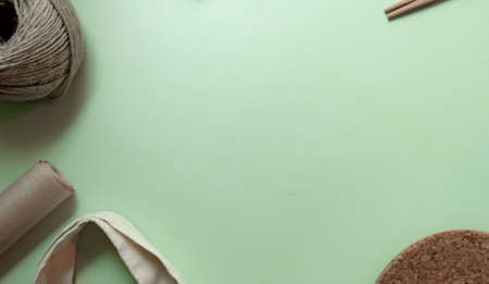 layout of recycled things on a green backgroundの写真素材