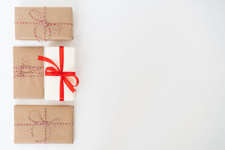 Christmas composition. Gifts with red decorations on white background. Christmas, winter, new year...