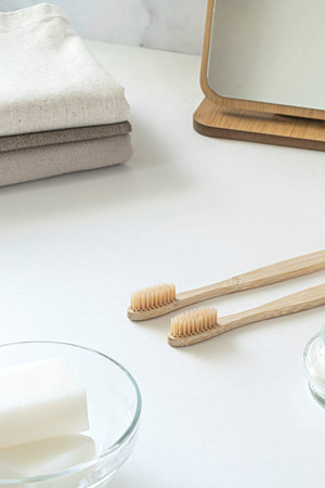 Zero waste concept. Set of eco friendly bathroom accessories - bamboo toothbrushes, cotton buds,...