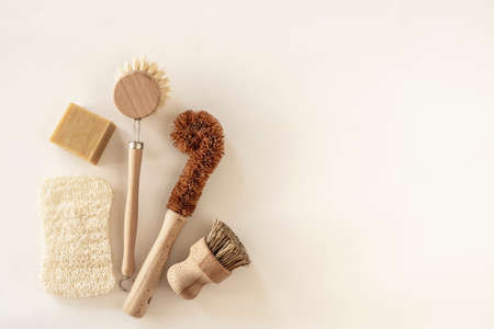 Zero waste kitchen cleaning concept. Eco friendly natural cleaning tools and products, bamboo dish brushes. No plastic, eco-friendly lifestyle. Top view, flat lay.の写真素材