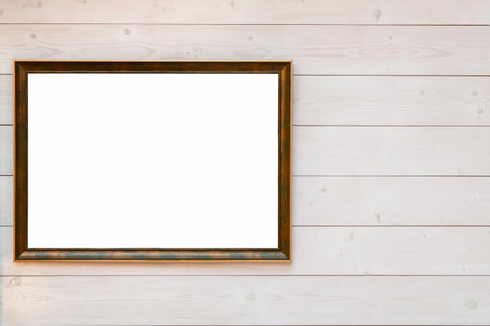 Metal dark frame for a picture on wooden wall with copy spaceの写真素材