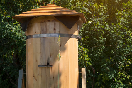 Wooden beehive closeup on sunny day. APIcultureの写真素材