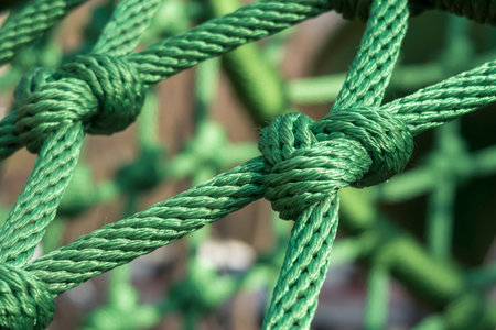 Green rope net close up. Selective focus.