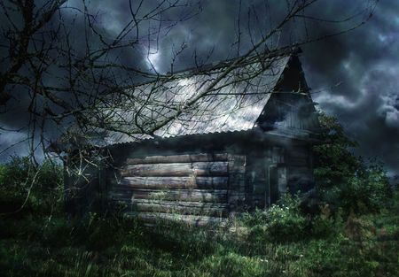 The thrown small house in twilightの写真素材