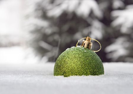 New Year's ball in a snow の写真素材
