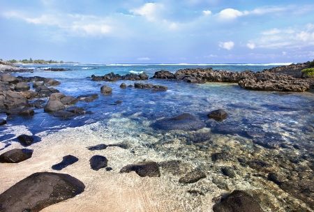 Stones on an ocean coast and shoalの写真素材