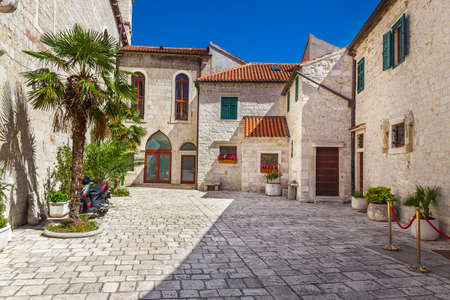 Narrow old streets and yards in Sibenik city, Croatia, medieval zoneの写真素材