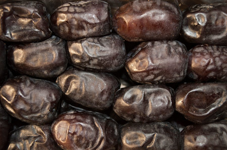 Large ripe dates. Selected fruits of dried fruits dates. Sweet fruit.