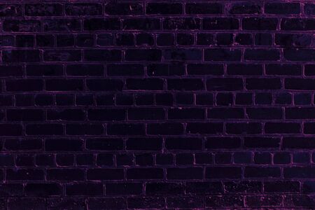 Dark brick wall with violet elements. Art imageの写真素材
