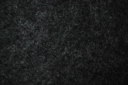 Black felted wool with a pile close-up. Textureの写真素材
