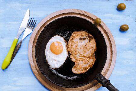 Breakfast concept, egg, chop, cheese, sandwiches.の写真素材