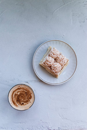Dalgona coffee and tiramisu dessert on a gray background.Top view.の写真素材