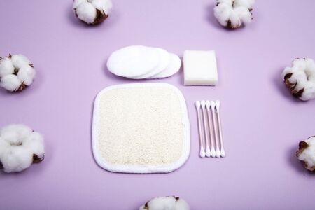 Beauty and spa composition with cosmetic products and cotton on color backgroundの写真素材