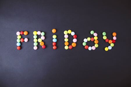 Black friday text made from colorfull candies.の写真素材