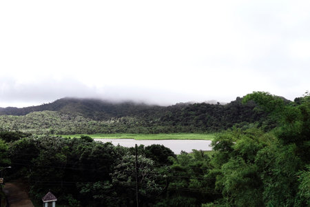 Beautiful lake in rainforest and mountains. Grand Etang National Forest with view of Lake and Rain...