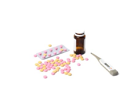 medicines, protective mask, thermometer, hand isolated on white backgroundの写真素材