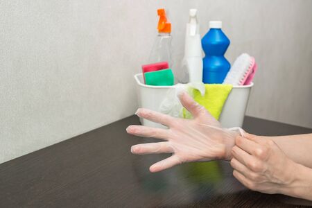 surface treatment with detergents in gloves, home cleaning from the tableの写真素材
