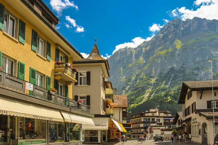 Grindelwald, Switzerland - July, 2013: Dorfstrasse street in Grindelwald with parts of Mattenberg in the backgroundのeditorial素材