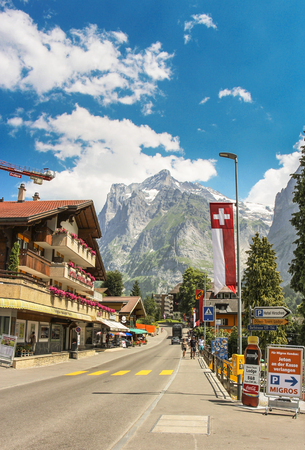 Grindelwald, Switzerland - July, 2013: Dorfstrasse street in Grindelwald with parts of Mattenberg in the backgroundのeditorial素材
