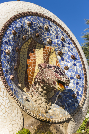 Barcelona - December 2018: Mosaic serpent head fountain at Park Guellのeditorial素材