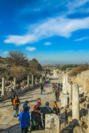 Selcuk, Ä°zmir Province, Turkey - Dec 2015: Tourists along Curete Street in the ruins of Ephesus cityのeditorial素材