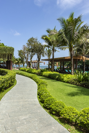Phu Quoc, Vietnam - 19th May 2019: A curved pathway at Dusit Princess Moonrise Beach Resortのeditorial素材