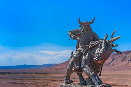 Turpan, Xinjiang, China - 11th July 2014: Bronze statue of Journey to the West character Bull Demon King at the Flaming Mountainsのeditorial素材