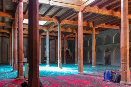 Turpan, Xinjiang, China - 10th July 2014: The interior praying halls of the mosque adjacent to Emin Minaret supported by wooden pillarsのeditorial素材