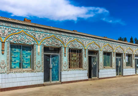 Xinjiang, China- 10th July 2014: Exterior design with islamic influence of a local restaurant in Turpanのeditorial素材