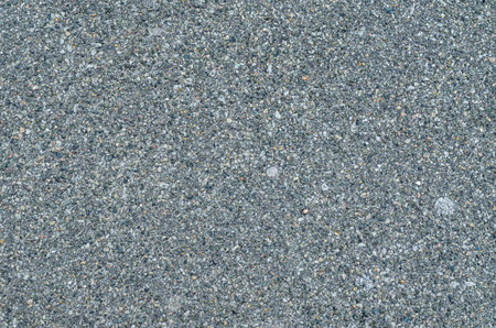 Light grey asphalt background. Monochrome texture of road surface. Texture of the covering road.の写真素材