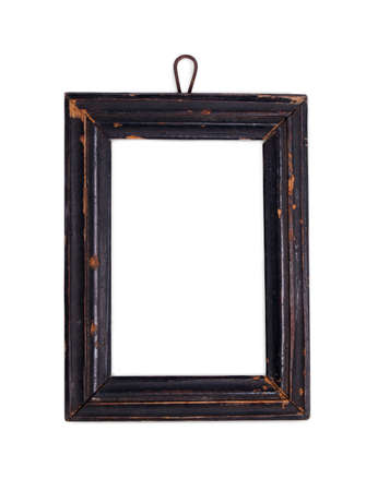 Old black wooden picture frame on white background with clipping path. Vintage wooden empty frame for photo.の写真素材