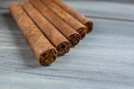 Cigars on the wooden backgroundの写真素材