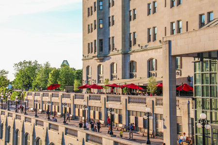Ottawa, Ontario Canada - June 8, 2019: The locks of the Rideau Canal alongside the Fairmont Chateau Laurier hotel in summer.のeditorial素材