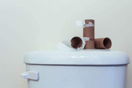 Center of a toilet paper rolls without paper on a white background with copy spaceの写真素材