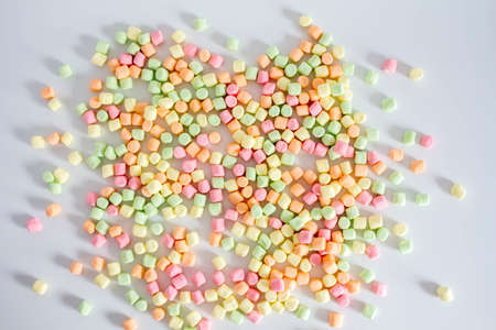 Colorful marshmallows white background with copy space. Top viewの写真素材