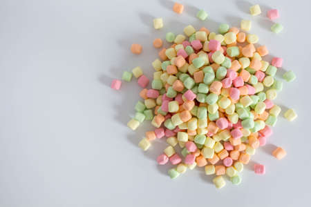 Colorful marshmallows white background with copy space. Top viewの写真素材