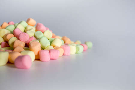 Colorful marshmallows white background with copy space. Top viewの写真素材