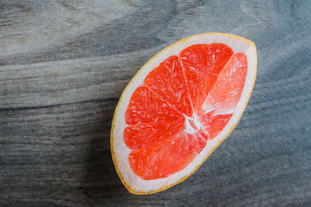 grapefruit on the wooden backgroundの写真素材