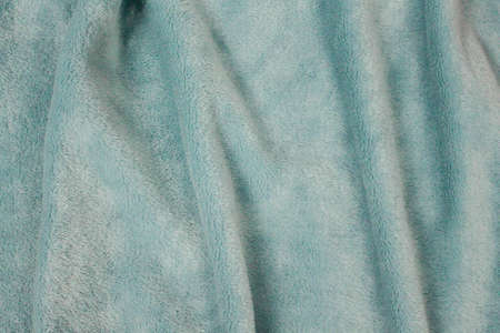 Plush cute blanket wavy texture. Light blue with shadows waves.の写真素材