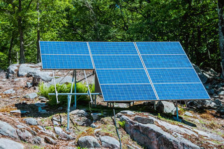 solar panels with the sunny sky. background of photovoltaic modules for renewable energy.の写真素材