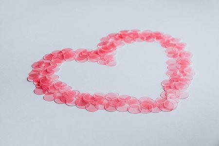 heart rose coins pink round medals, heart-shaped frame petals, love concept.の写真素材