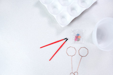 Close-up easter egg painting and decorating tools. Accessories for easter eggs painting. Space for textの写真素材