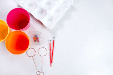Close-up easter egg painting and decorating tools. Accessories for easter eggs painting. Space for textの写真素材