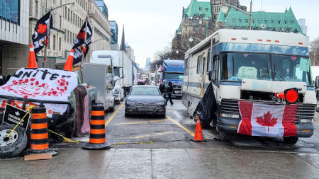 Freedom convoy 2022 in downtown Ottawa, Convoy of freedom. Canadian convoy protest against COVID-19 vaccine. No vaccine mandates Ottawa Ontario, Canada - February 1, 2022のeditorial素材